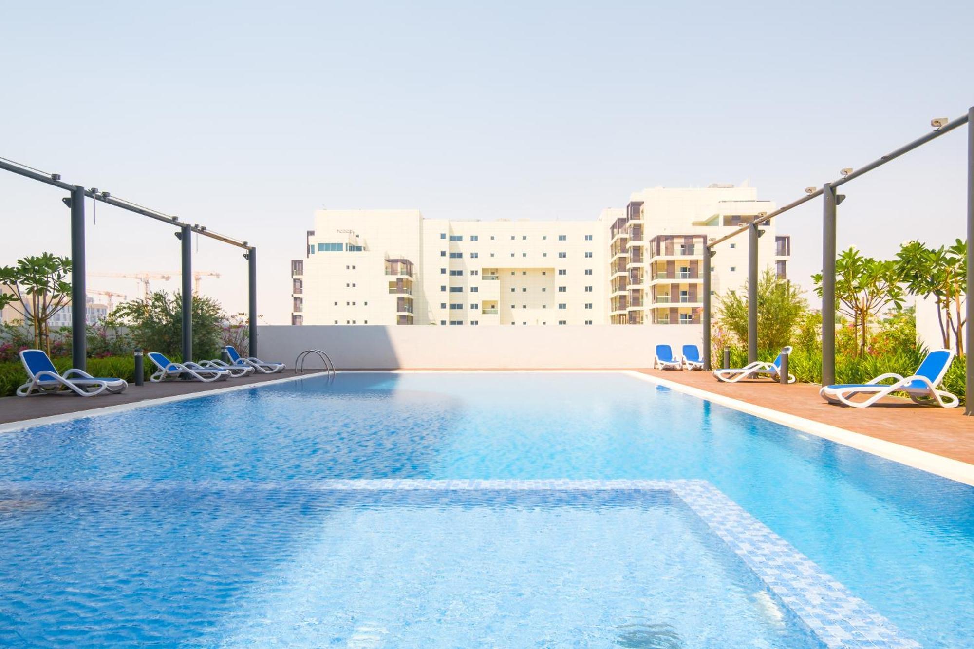 Poolside Charm Appartement Abu Dhabi Buitenkant foto